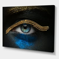 Designart 'Girl Eyes With Gold Chain and Blue Pigment' Modern Canvas Wall Art Print