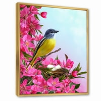 Designart' mala žuta ptica u blizini gnijezda s ružičastim cvijećem ' tradicionalni uramljeni platneni